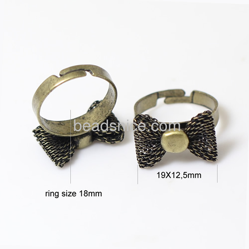 Finger ring brass bow tie 19x12.5mm