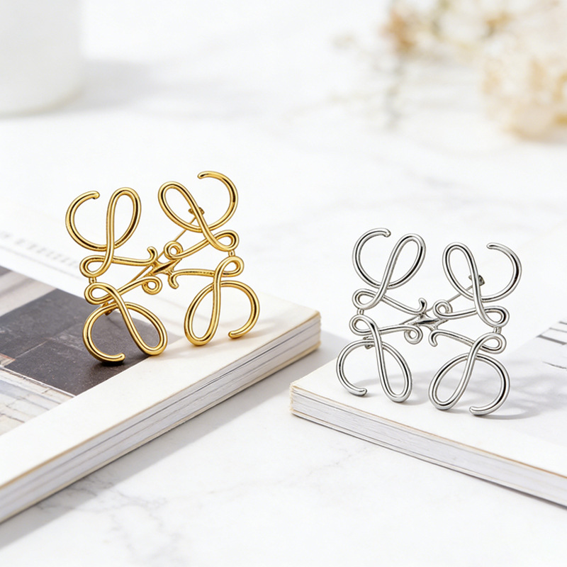 Alloy geometric square brooch, hollowed-out minimalist style with unique design, high-end lapel pin