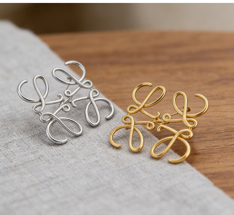 Alloy geometric square brooch, hollowed-out minimalist style with unique design, high-end lapel pin
