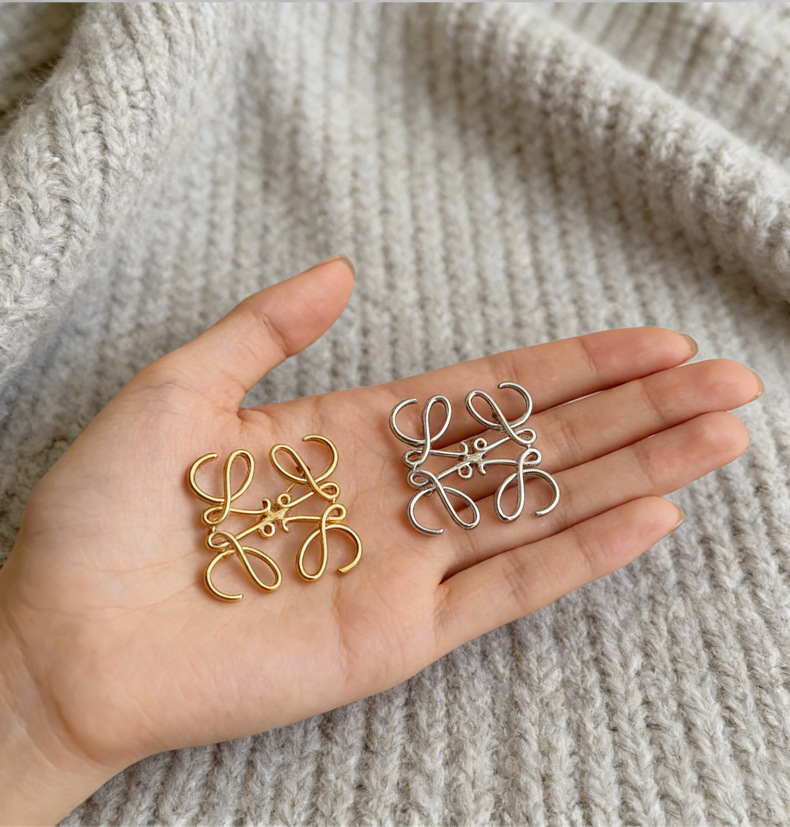 Alloy geometric square brooch, hollowed-out minimalist style with unique design, high-end lapel pin